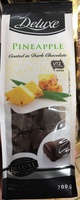 Pineapple coated in dark chocolate