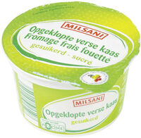 Opgeklopte verse kaas, gesuikerd.