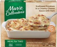 Scalloped potatoes in creamy cheese sauce with ham
