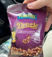 Roasted cashews with milk chocolate drizzle
