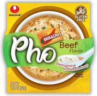 Pho beef rice noodle soup wtth sriracha