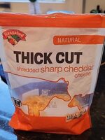 Shredded sharp cheddar cheese