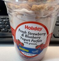 Fresh strawberry & blueberry yogurt parfait with granola
