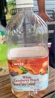 White Cranberry Peach Cocktail In A Blend With Grape Juice