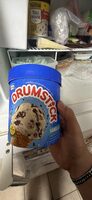 Ice cream, vanilla ice cream swirled with fudge, chocolatey coated peanuts and cone pieces