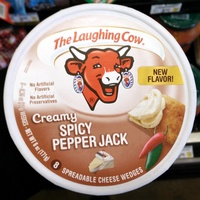 Spreadable cheese wedges
