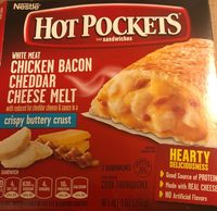 White meat chicken bacon cheddar cheese melt with reduced fat cheddar cheese & sauce in a crispy buttery crust sandwiches, white meat chicken bacon cheddar cheese melt