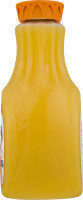 Pure premium orange juice some pulp