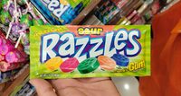Razzles, sour gum candy, lemon, cherry, lime, orange, blue raspberry