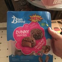 Chocolate hazelnut flavored reduced fat ice cream with a hazelnut fudge ribbon dipped in chocolaty coating and hazelnut pieces drizzled with chocolaty coating bars