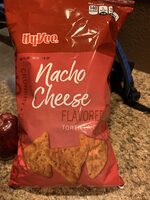 Nacho cheese flavored tortilla chips, nacho cheese