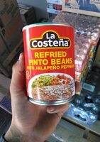 Refried pinto beans with jalapeno peppers