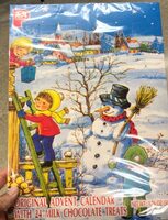 Traditional advent calendar with milk chocolate treats by pea