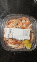 Shrimp cocktail with cocktail sauce and lemon