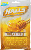 HALLS - RELIEF Coughs & Soothes Sore Throats. Honey Lemon