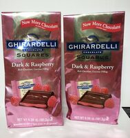 Dark chocolate candy squares with raspberry filling