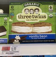 Vanilla bean ice cream sandwiched between chocolate chip cookies, vanilla bean