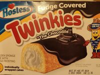 The chocodile fudge covered golden sponge cake with fudge frosting