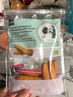 Organic wholegrain breadsticks with tomato