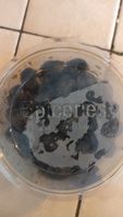 Olives noires confites dénoyautées en saumure