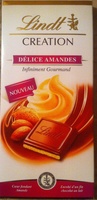 Création - Chocolat au lait, cœur de truffe à la poudre d'amande