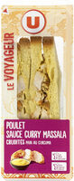 Sandwich au pain de mie spécial indien garni de filet de poulet traitéen salaison, d'une sauce au curry et de crudités