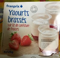 Yaourt sur lit de confiture de fraises
