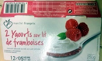 2 yaourts sur lit de framboise