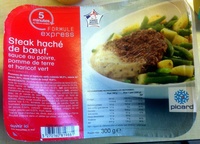 Steak haché de boeuf, sauce au poivre, pomme de terre et haricot vert