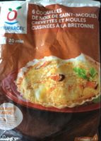 Coquilles de noix de st jacques, crevettes et moules cuisinées à la bretonne