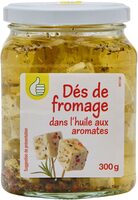 Dés de fromage dans l'huile aux aromates