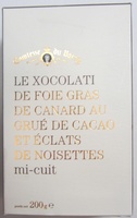Le xocolati de foie gras de canard au grué de cacao et éclats de noisettes mi-cuit