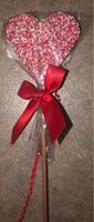Sucette coeur en chocolat au lait
