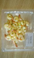 Queues de crevettes cuites citron romarin