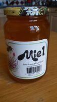 Miel mis en pot par l'apiculteur