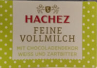 Edelvollmilchschokolade mit weißer und Zartbitterschokolade garniert