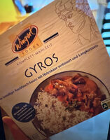 Gyros in Tomaten Knoblauch-Sauce mit Hirtenkäse verfeinert und Langkornreis