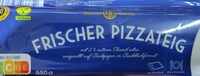 Frischer Pizzateig auf Backpapier XXL