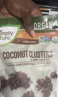 Coconut clusters in dark chocolate pumpkin + sunflower +quinoa