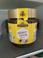 Blütenhonig flüssig im Glas