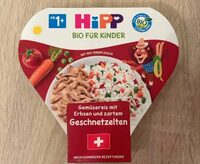 Gemüsereis mit Erbsen und zartem Geschnetzelten