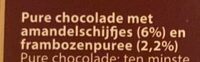 Pure chocolade met amandelschijfjes en frambozen
