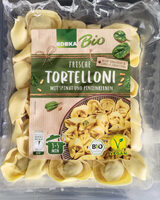 Tortellini mit Spinat und Pinienkernen