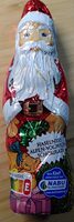 Schokoladen Weihnachtsmann Haselnuss Alpen-Vollmilchschokolade
