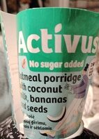 Oat-rye porridge with coconut milk, bananas and seed