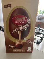 Milk chocolate egg with lindor tiramisu truffles