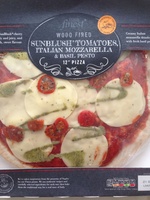 Wood fired sunblush tomatoes, italian mozzarella & basil pesto 12'' pizza