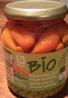 Petits pois et jeunes carottes