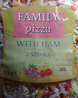 Pizza z szynką wieprzową, na podpieczonym spodzie.