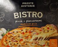 Pizza z pieczarkami na podpieczonym spodzie. Produkt głęboko mrożony.